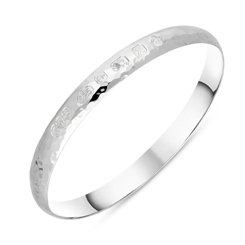 Sterling Silver Queen's Jubilee Hallmark 8mm Hammered Bangle D sold by C.W. Sellors