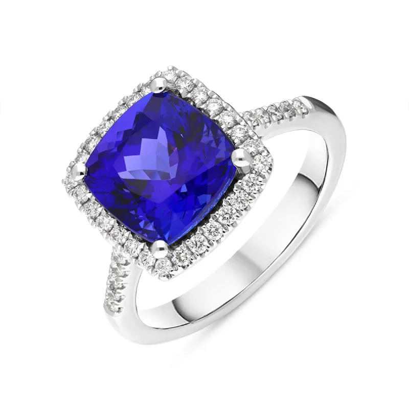 18ct White Gold Tanzanite Diamond Cushion Cut Shoulder Set Halo Ring sold by C.W. Sellors