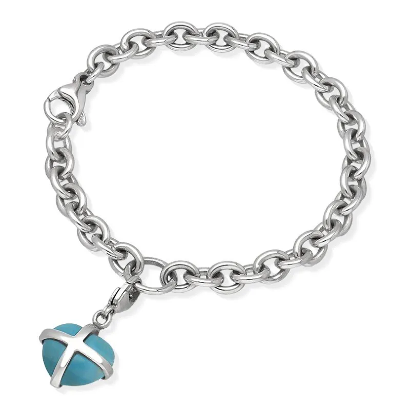 Sterling Silver Turquoise Small Cross Heart Charm Bracelet D sold by C.W. Sellors