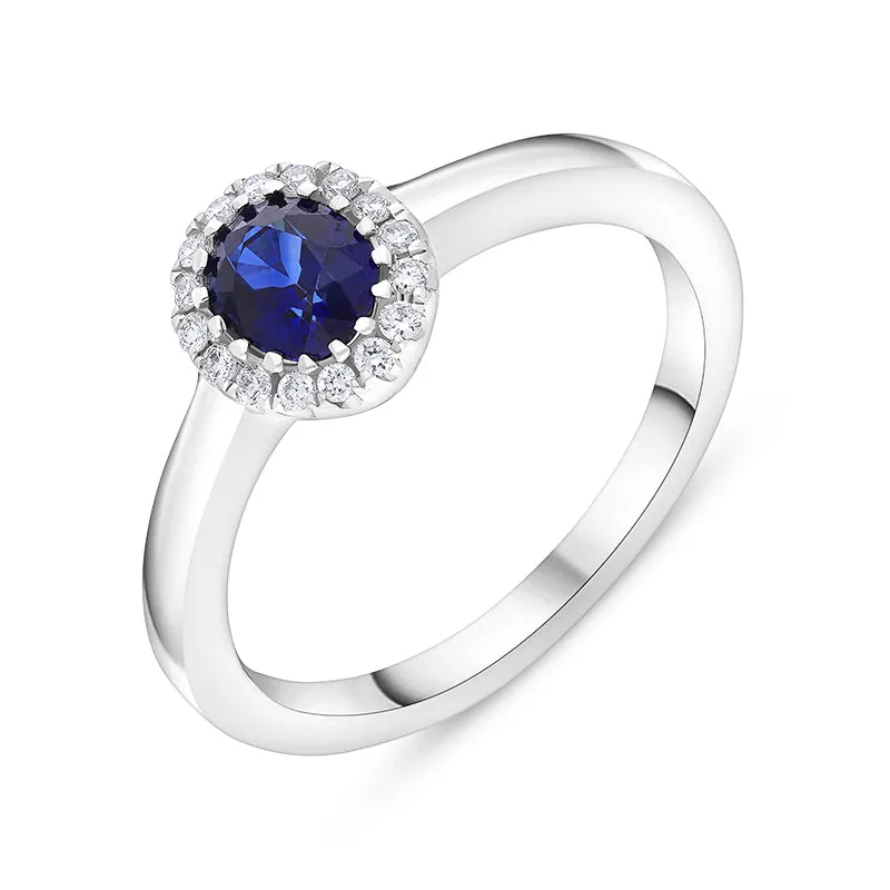 18ct White Gold 0.53ct Sapphire 0.08ct Diamond Oval Cluster Ring sold by C.W. Sellors