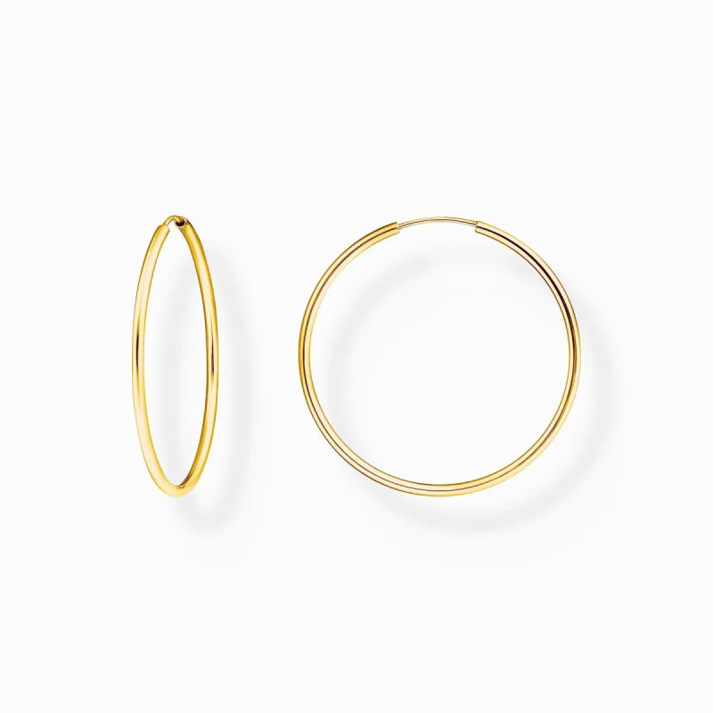 Thomas Sabo Gold Plated Sterling Silver Medium Hoop Earrings sold by C.W. Sellors