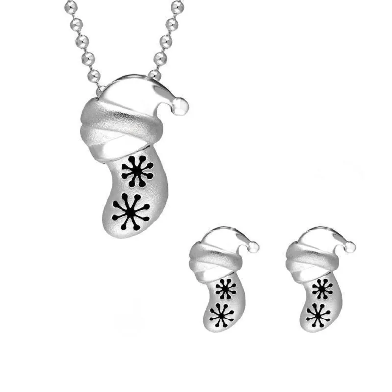 Sterling Silver Snowflake Stocking Two Piece Set sold by C.W. Sellors