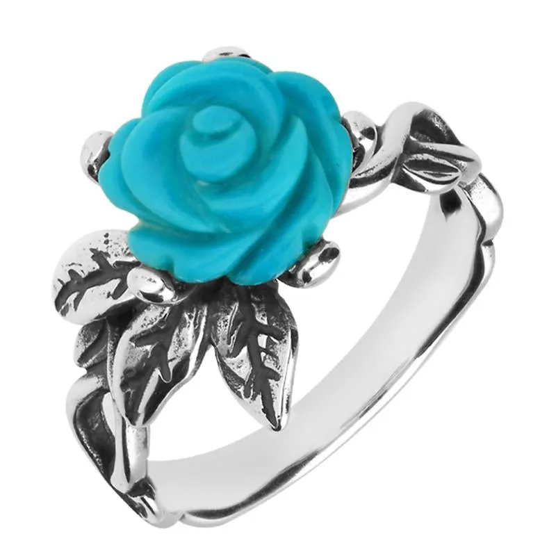 Sterling Silver Turquoise Tuberose 10mm Rose Leaf Twist Ring sold by C.W. Sellors