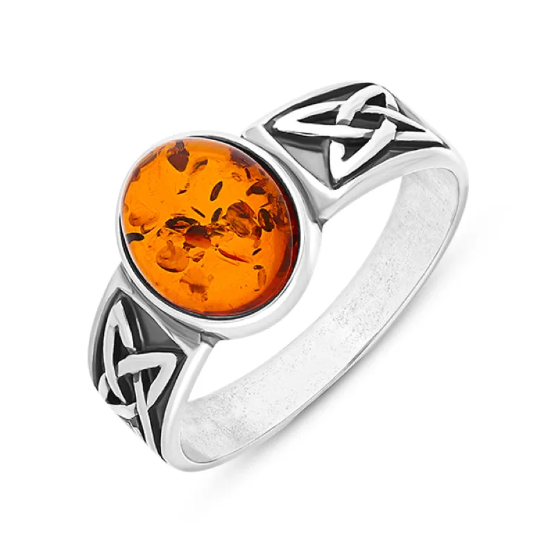 Sterling Silver Amber Celtic Band Ring sold by C.W. Sellors