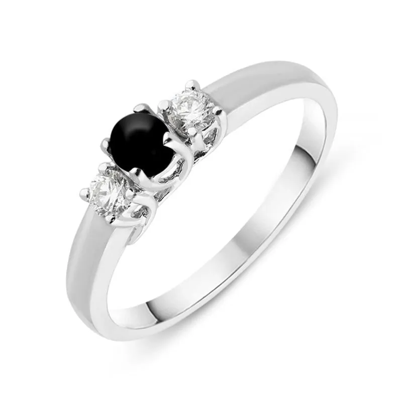 18ct White Gold Whitby Jet Diamond Trilogy Ring sold by C.W. Sellors