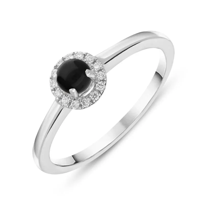 18ct White Gold Whitby Jet Diamond Round Cluster Ring sold by C.W. Sellors