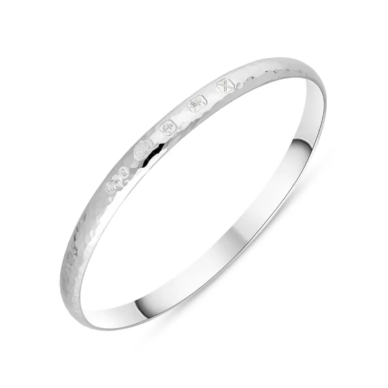 Sterling Silver Hallmark 6mm Hammered Bangle sold by C.W. Sellors