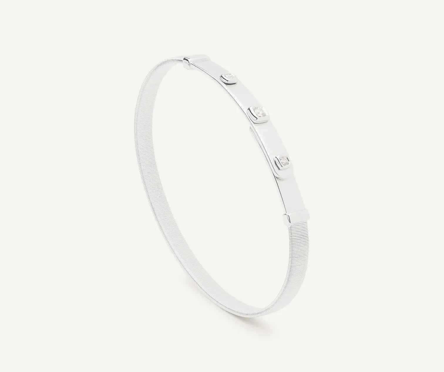 Marco Bicego Masai 18ct White Gold Coil 0.09ct Diamond Bangle sold by C.W. Sellors