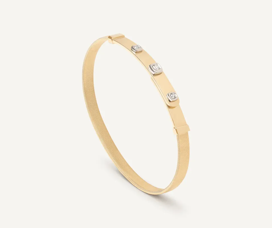 Marco Bicego Masai 18ct Yellow Gold Thin Coil 0.10ct Diamond Bangle sold by C.W. Sellors