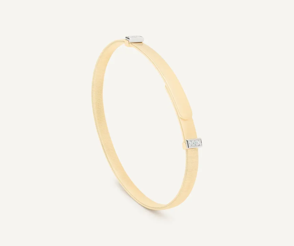 Marco Bicego Masai 18ct Yellow Gold Thin Coil 0.06ct Diamond Bangle sold by C.W. Sellors