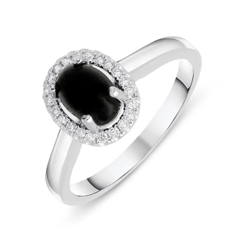 18ct White Gold Whitby Jet 0.12ct Diamond Oval Cluster Ring sold by C.W. Sellors
