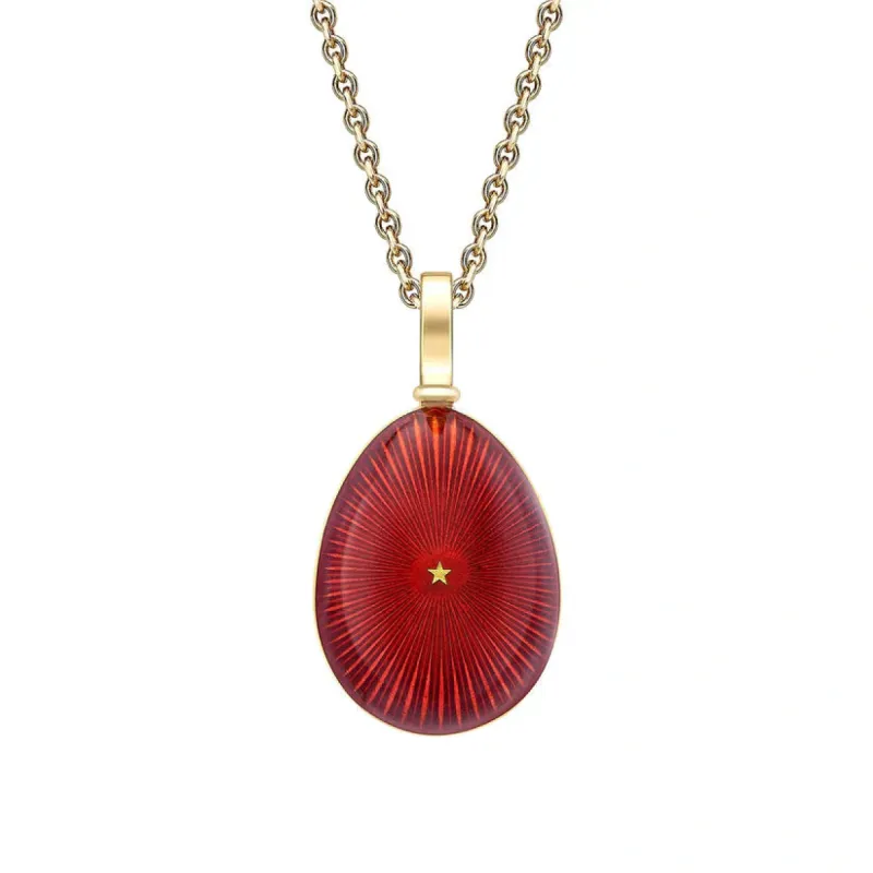 Faberge Heritage 18ct Yellow Gold & Red Enamel Star Burst Egg Pendant sold by C.W. Sellors