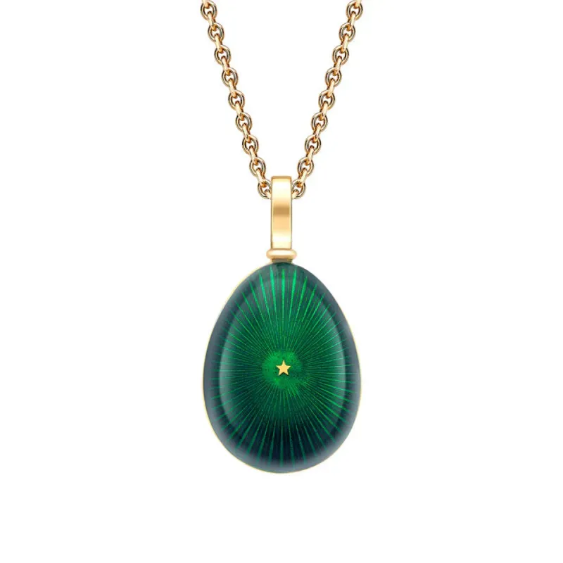 Faberge Heritage 18ct Yellow Gold & Green Enamel Star Burst Egg Pendant sold by C.W. Sellors