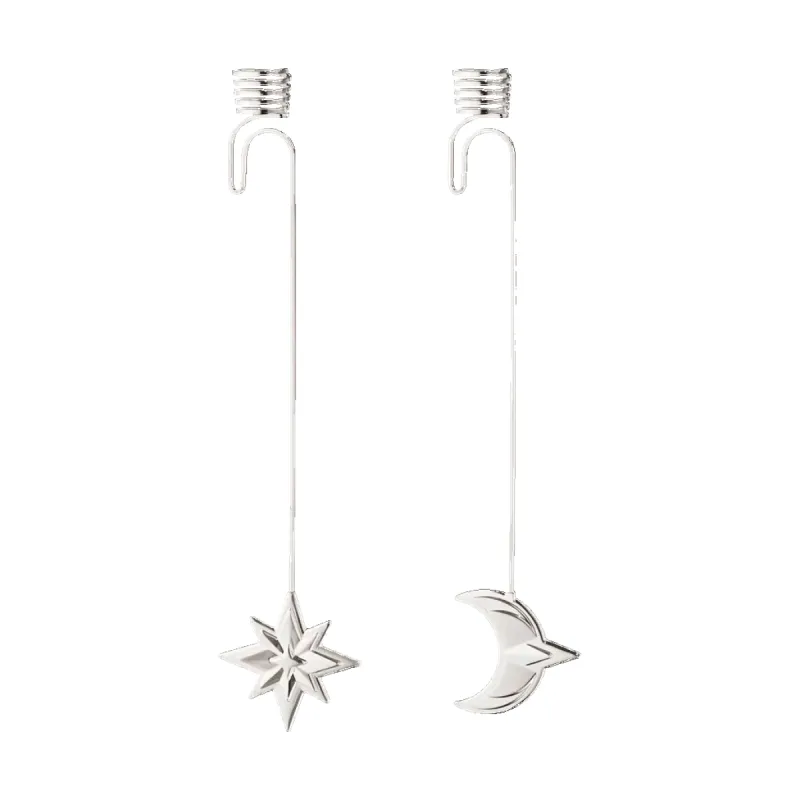 Georg Jensen Christmas Collection 2024 Palladium Plated Star & Moon Candleholder Set sold by C.W. Sellors
