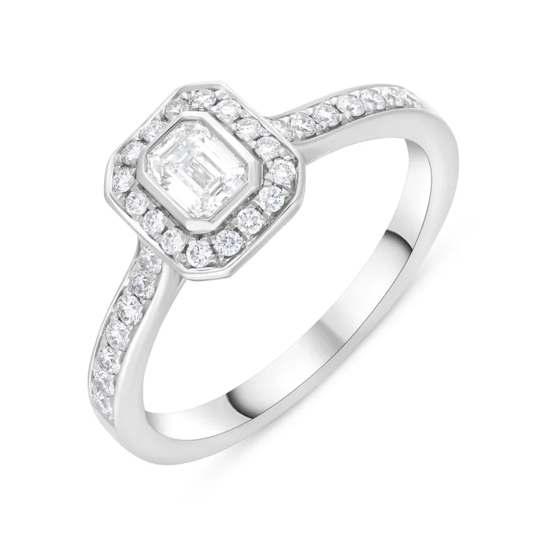 Platinum GIA Certified GVS2 0.59ct Diamond Emerald Cut Framed Cluster Ring sold by C.W. Sellors