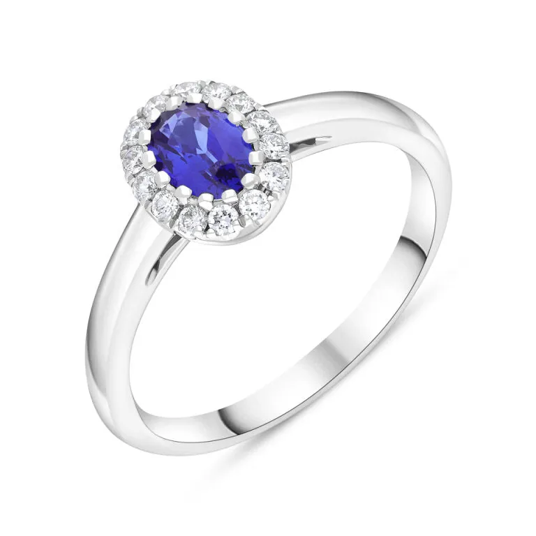 18ct White Gold 0.54 Sapphire 0.16 Diamond 14x1 Oval Claw Centre Grain Cluster Ring sold by C.W. Sellors