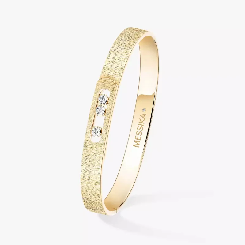 Messika Move Noa Ciselé 18ct Yellow Gold 0.15ct Diamond Bangle sold by C.W. Sellors