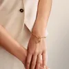 Thomas Sabo Gold Plated White Zirconia Snake Connect Charm sold by C.W. Sellors