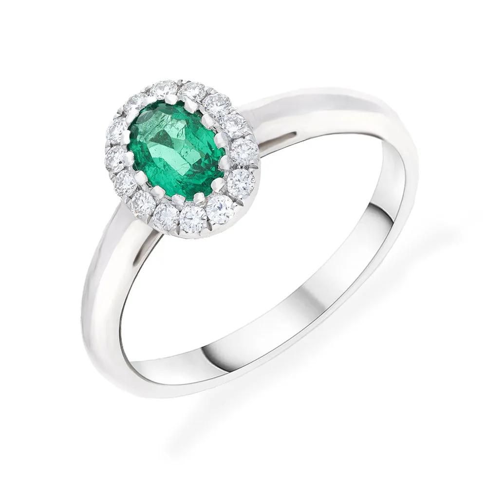 18ct White Gold 0.17 Diamond 0.43 Emerald Oval Centre Cluster Ring sold by C.W. Sellors