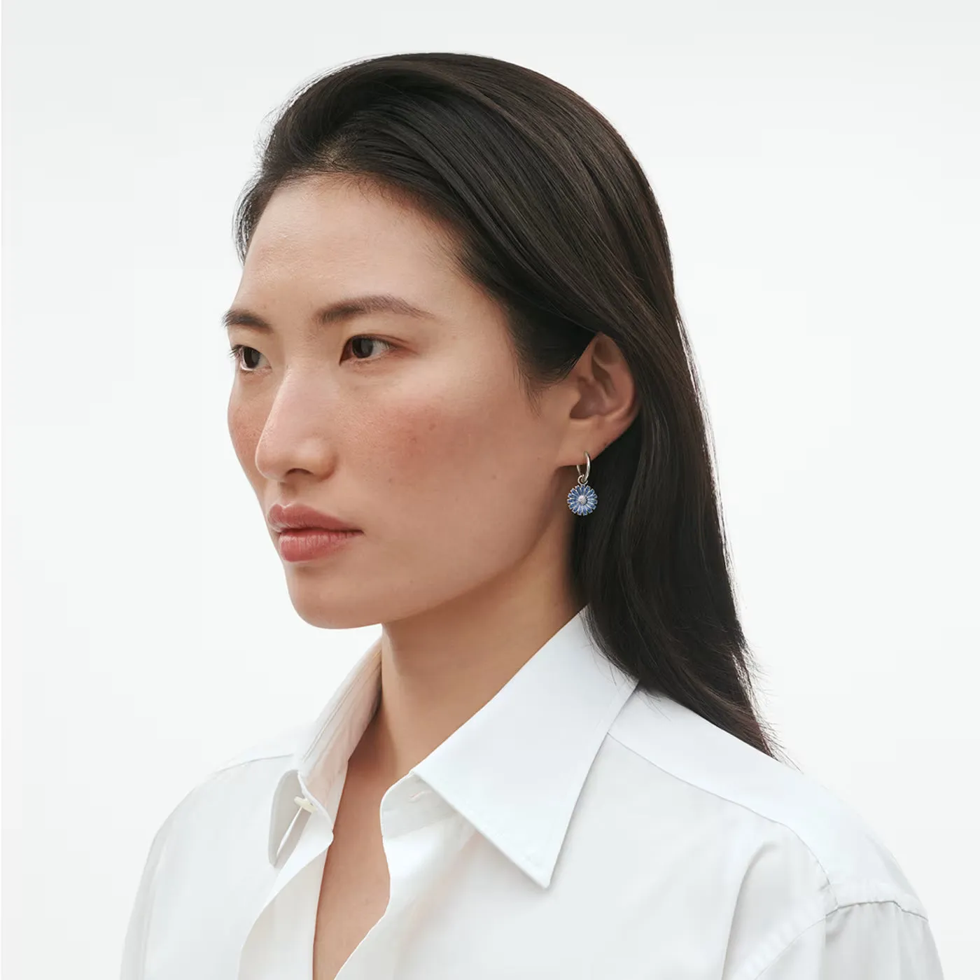 Georg Jensen Daisy Rhodium Plated Sterling Silver Blue Enamel Earrings sold by C.W. Sellors product image thumbnail 3