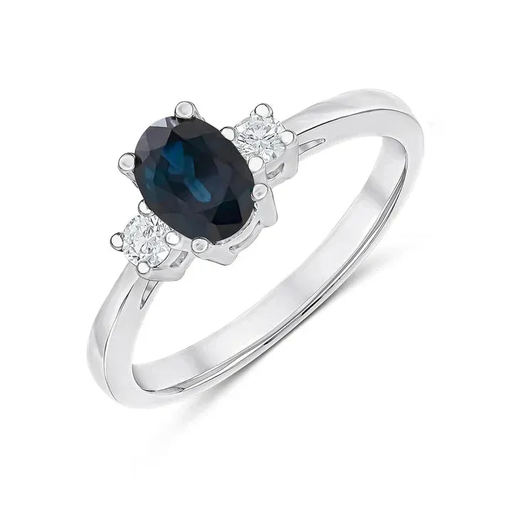 9ct White Gold 7x5 0.15ct Round Diamond & Oval Sapphire Claw Set 3st Ring sold by C.W. Sellors