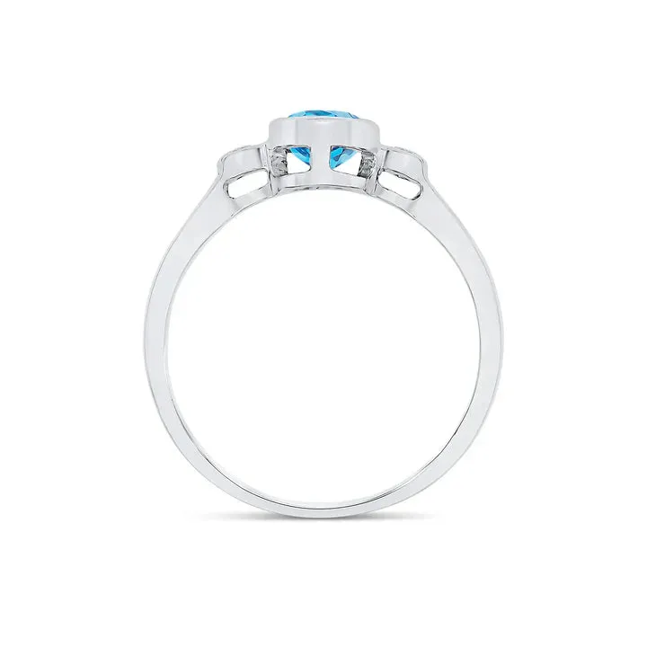 9ct White Gold 7x5 Oval Swiss Blue Topaz & Round Diamond 0.05ct 3st Rubover Ring sold by C.W. Sellors product image thumbnail 2