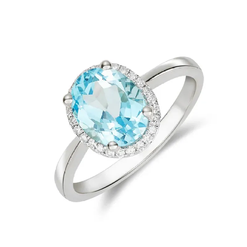 9ct White Gold 9x7 0.09ct Diamond & Swiss Blue Topaz Oval Claw Set Cluster Ring sold by C.W. Sellors