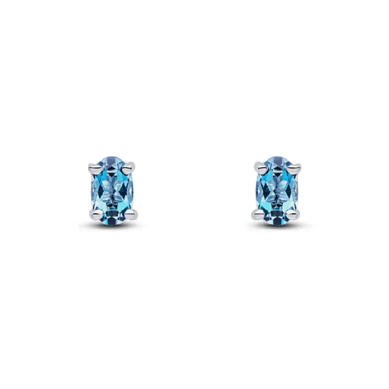 9ct White Gold 5x3 Oval London Blue Topaz Claw Set Earrings sold by C.W. Sellors