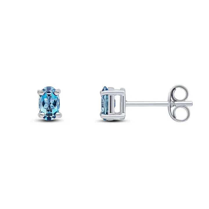 9ct White Gold 5x3 Oval London Blue Topaz Claw Set Earrings sold by C.W. Sellors product image thumbnail 2