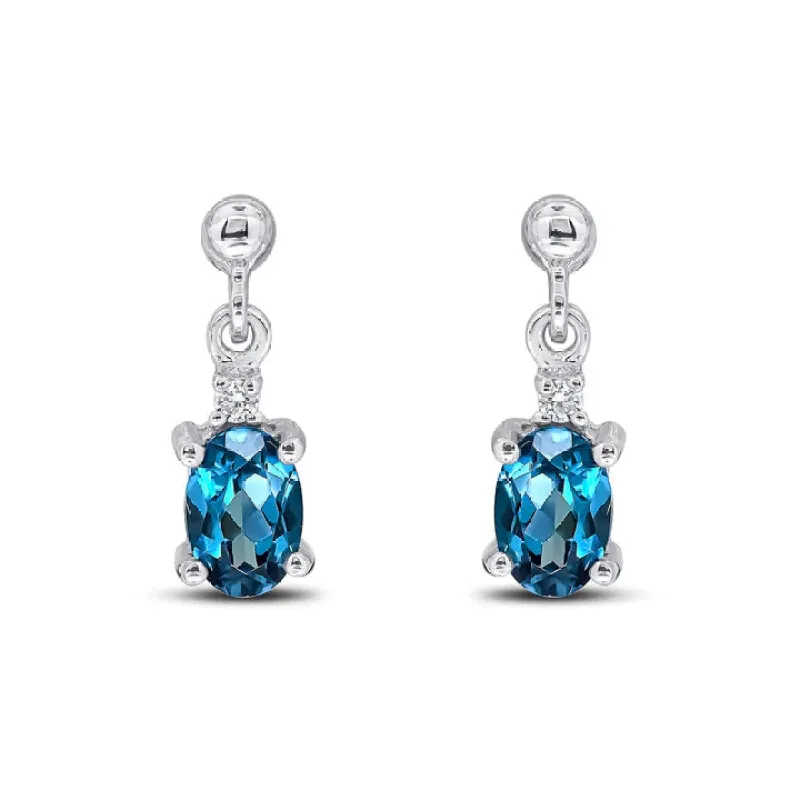 9ct White Gold Diamond & London Blue Topaz Oval Claw Set 2st Drop Earrings sold by C.W. Sellors