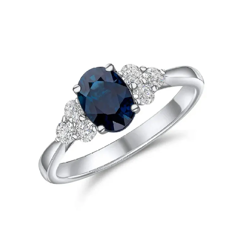 18ct White Gold 0.30ct Diamond & 1.32ct Oval Sapphire Trefoil Sholder Ring sold by C.W. Sellors