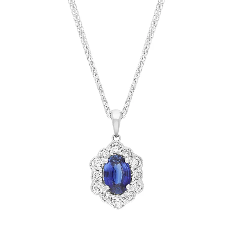 18ct White Gold Sapphire Diamond Cluster Oval Pendant made by C.W. Sellors