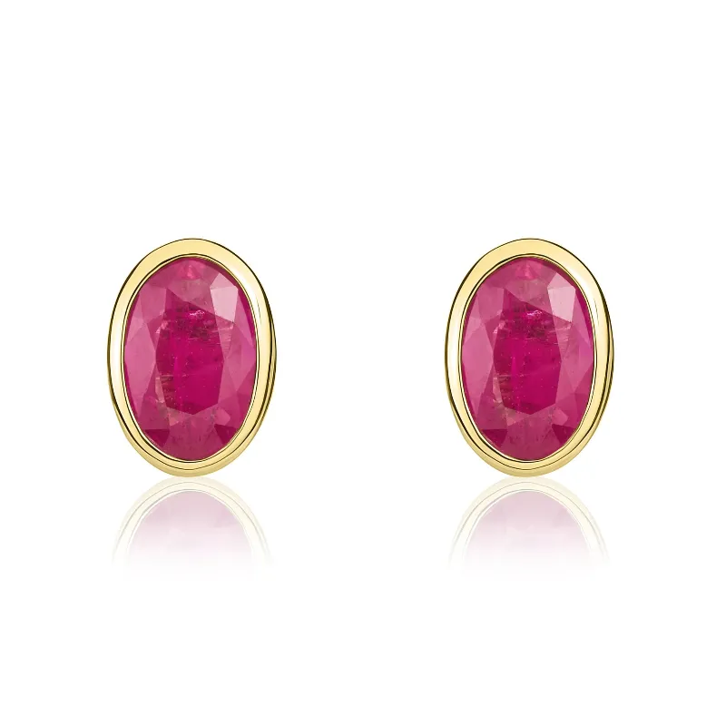 9ct Yellow Gold Ruby 6x4mm Oval Rub Over Set Stud Earrings made by C.W. Sellors