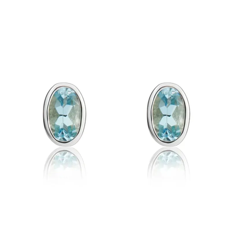 9ct White Gold Aquamarine 5x3mm Oval Rub Over Set Stud Earrings made by C.W. Sellors