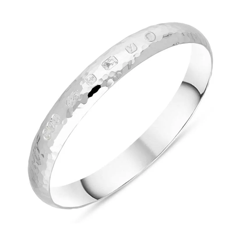 Sterling Silver King's Coronation Hallmark 10mm Hammered Bangle D sold by C.W. Sellors