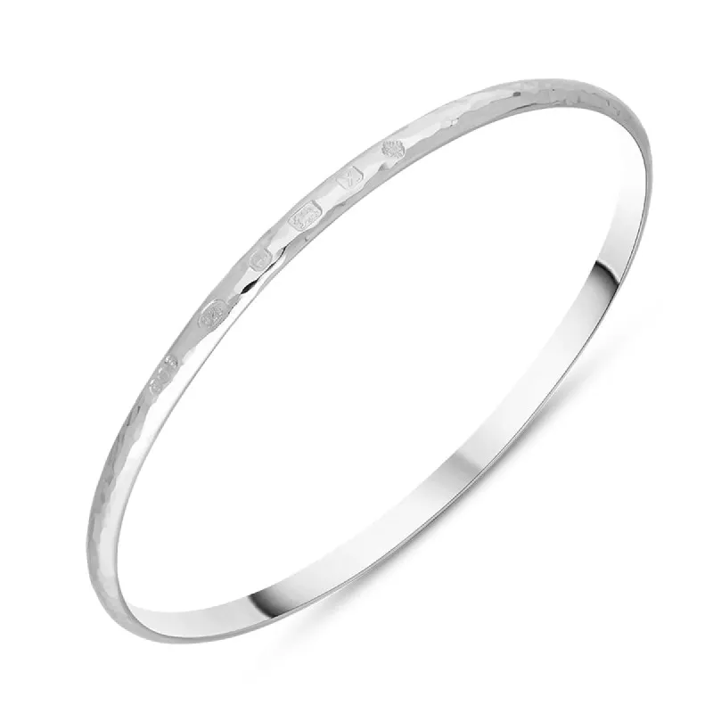 Sterling Silver Queen's Jubilee Hallmark 4mm Hammered Bangle D sold by C.W. Sellors