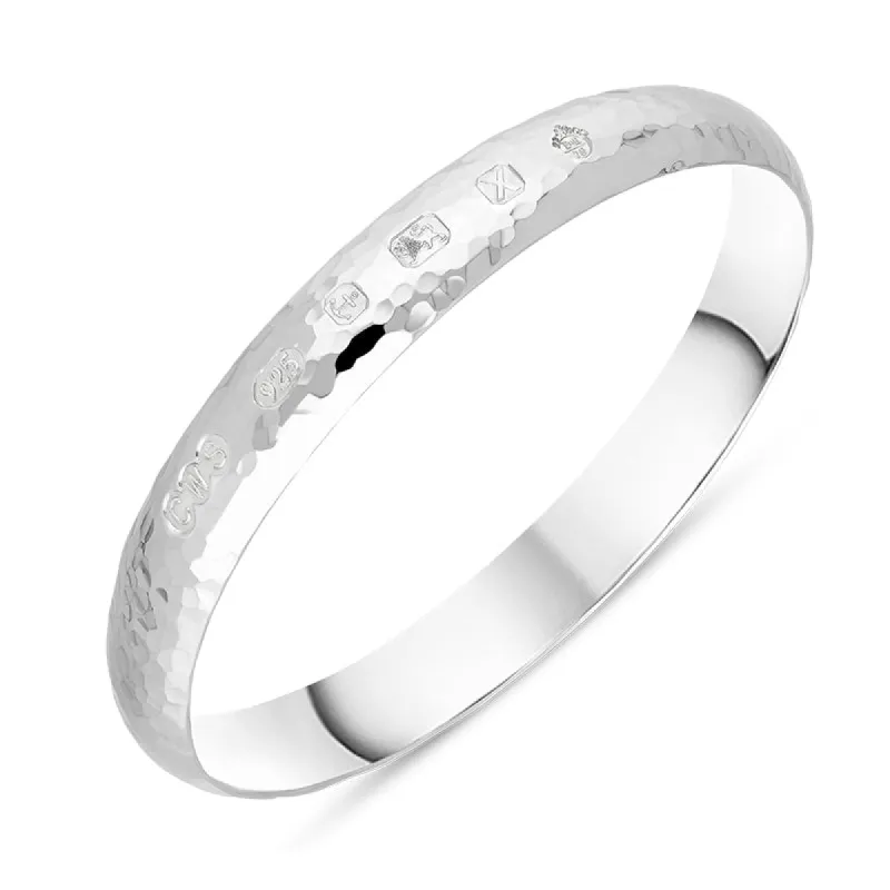Sterling Silver Queen's Jubilee Hallmark 10mm Hammered Bangle D sold by C.W. Sellors