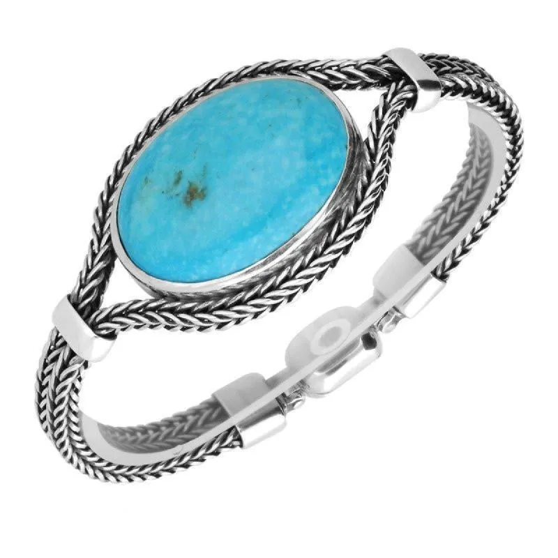 Sterling Silver Turquoise Large Landscape Oval Foxtail Bracelet D sold by C.W. Sellors
