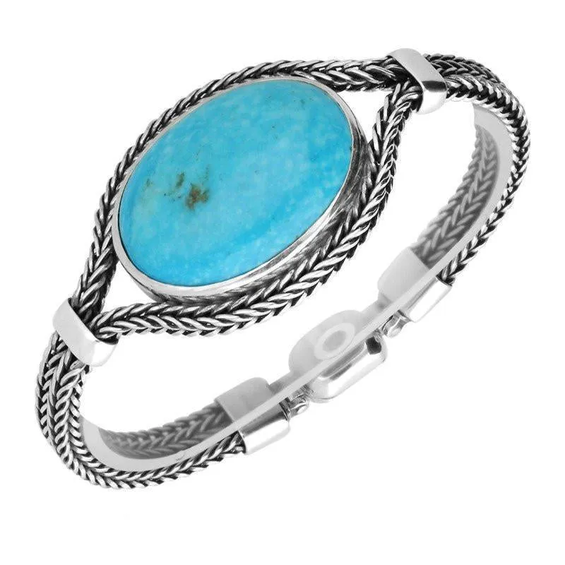 Sterling Silver Turquoise Large Landscape Oval Foxtail Bracelet D sold by C.W. Sellors