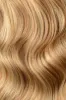 Double Wefted Full Head Remy Clip in Human Hair Extensions - Butterscotch Blonde (#10/16) sold by Cliphair