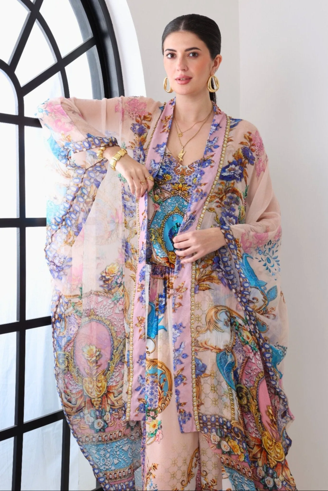 Peacock Dreams Medium Cape sold by Czarina