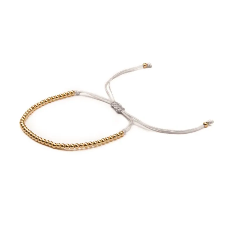 METAL BEAD BRACELET THIN GOLD GREY sold by DARK Department