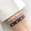 LEATHER STAR STUD BRACELET MINI BLACK W/GOLD sold by DARK Department