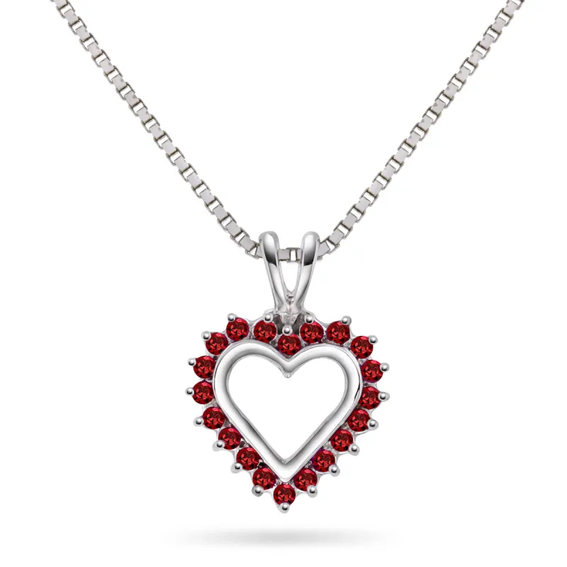 Halssmykke med rubiner i hvitt gull sold by Diamanthuset