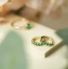 Pan Jewelry – Øreringer i sølv med grønn zirkonia sold by Diamanthuset