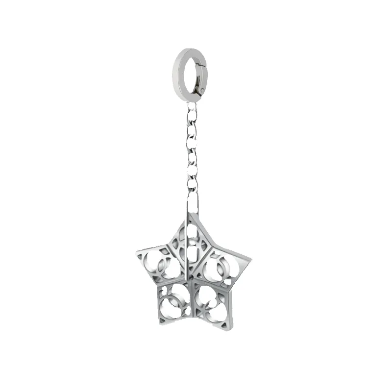 Dorne Spinning Star Memento Charm In White Gold sold by Dorne