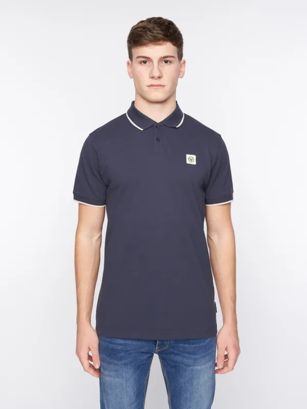 Wilkins Polo Navy sold by Duck and Cover