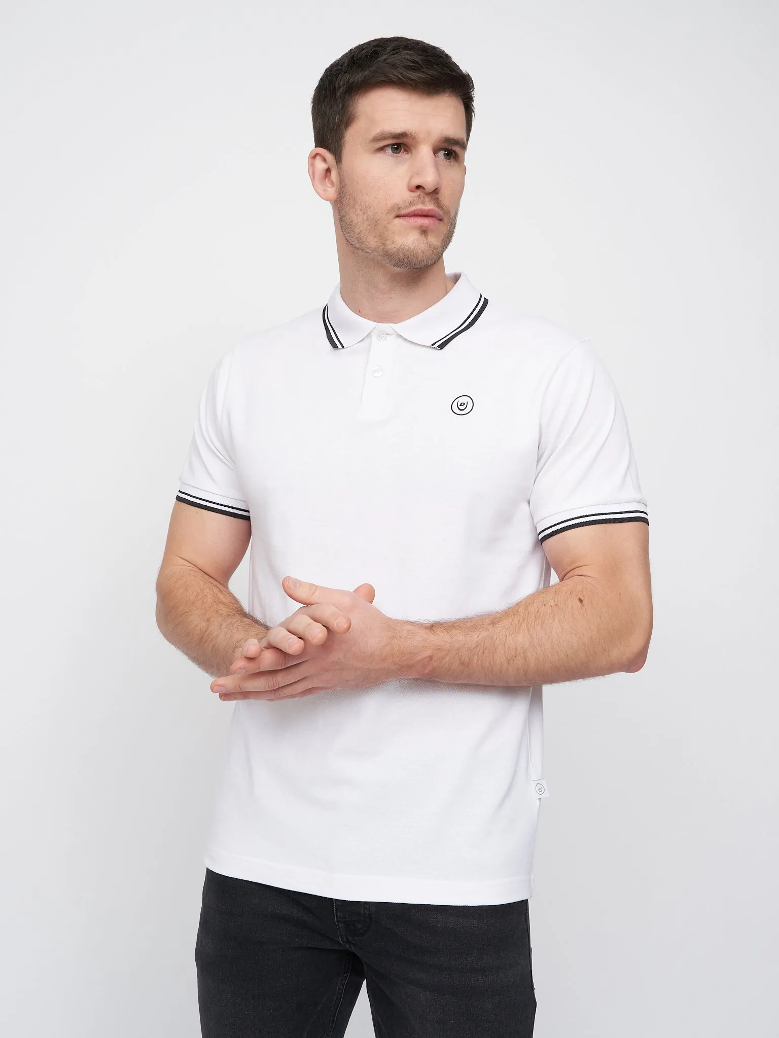 Hendamore Polo White/Black sold by Duck and Cover