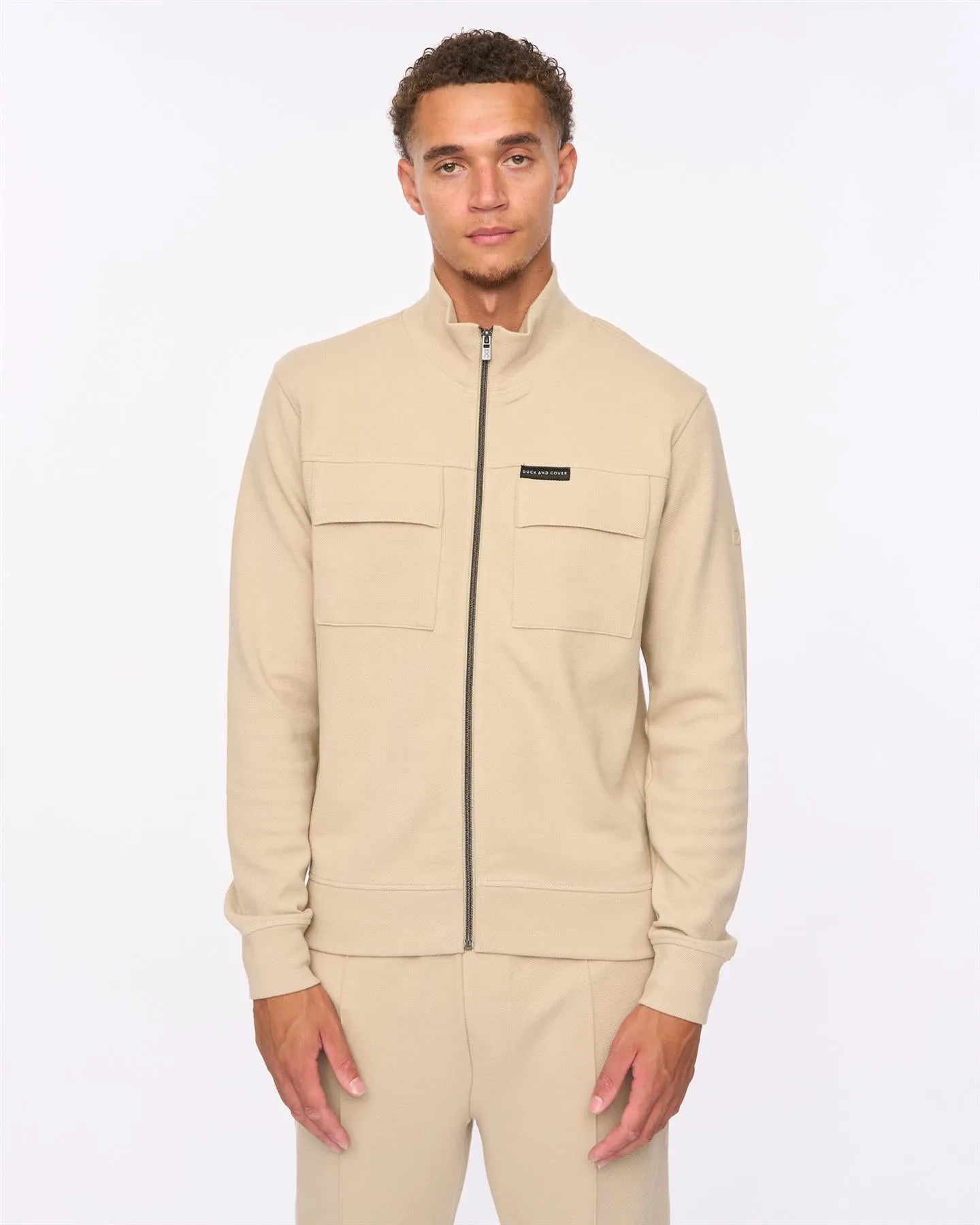 Tames Zip Thru Sweat Stone sold by Duck and Cover