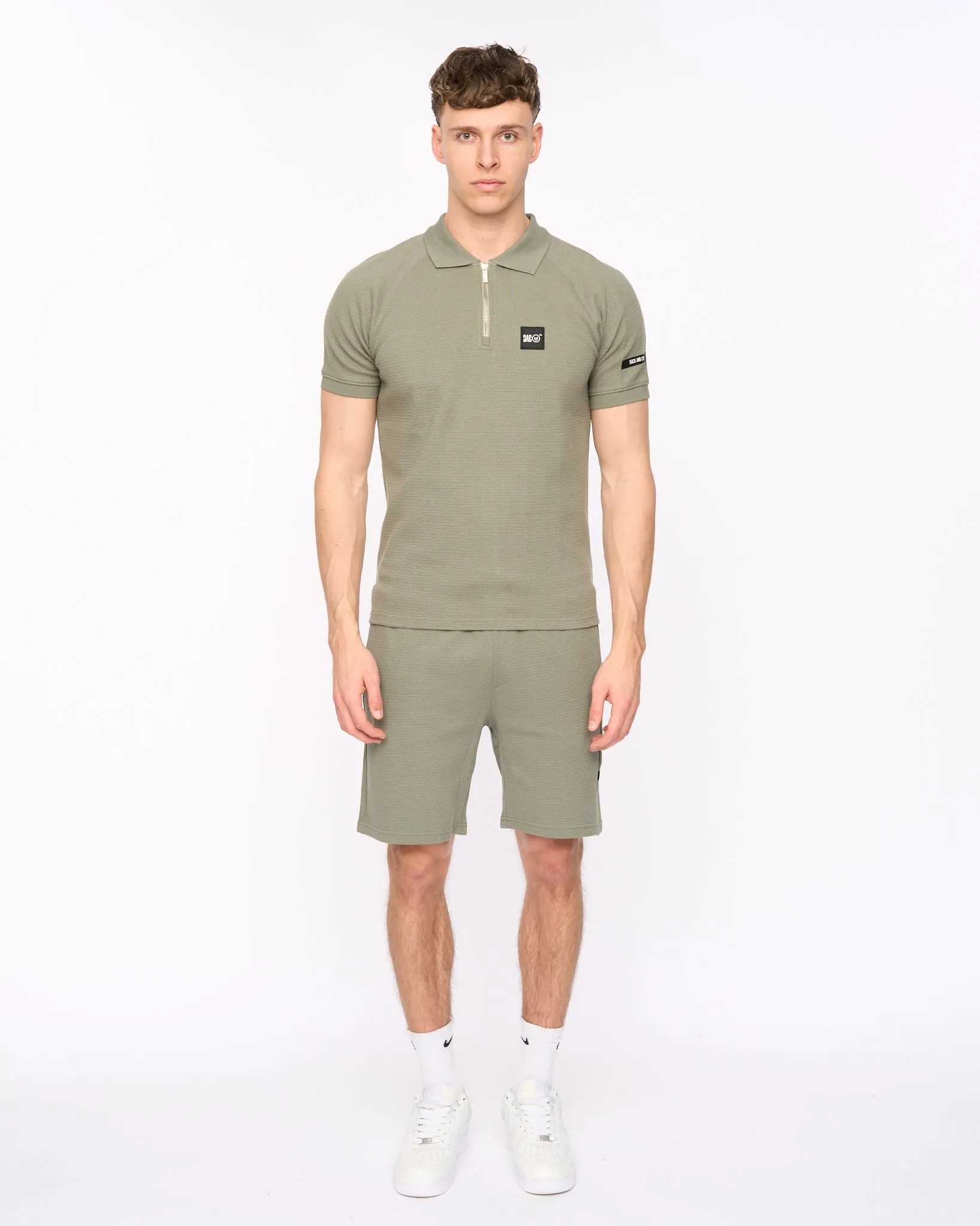 Topfield Polo & Short Olive sold by Duck and Cover